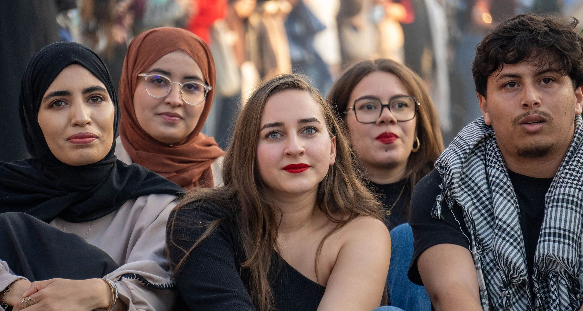 A large group of people of many nationalities and ages